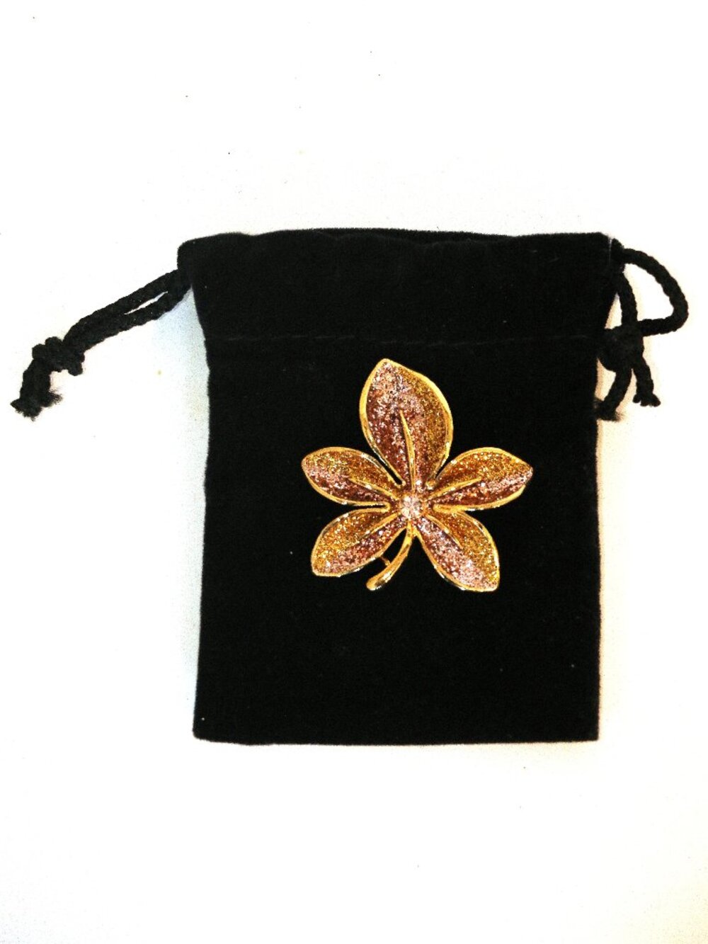Gold-toned flower magnetic brooch from Joan Rivers Collection